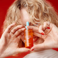 Crown Companion Scalp & Hair Oil with model